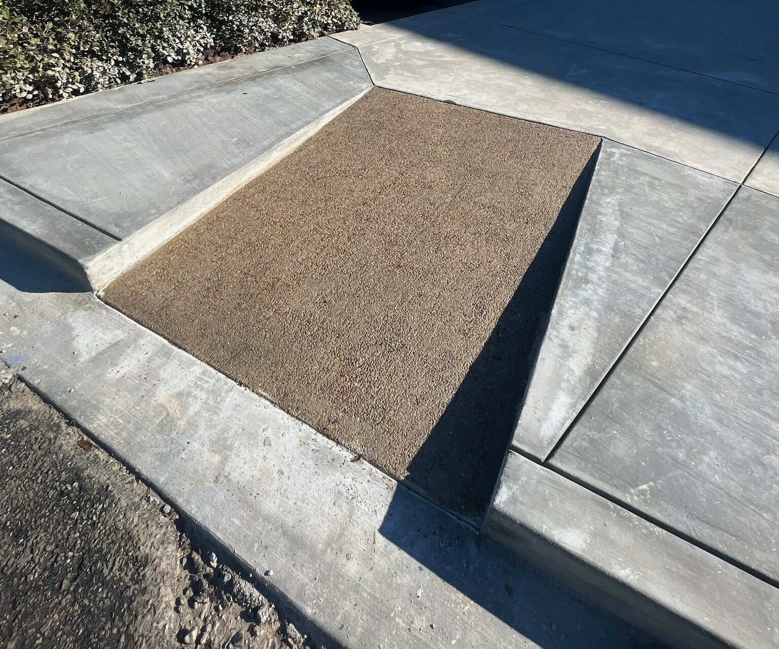 Exposed Aggregate Concrete Finish on Concrete ADA Ramp
